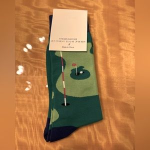 NWT = Golf Socks. Great gift. 80% Cotton 15% Acrylic 5% Spandex. Great Gift.